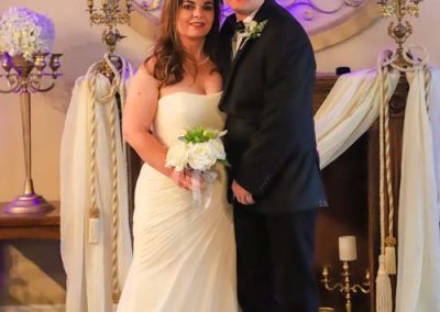 Couple after their wedding at Cavender Castle Chapel