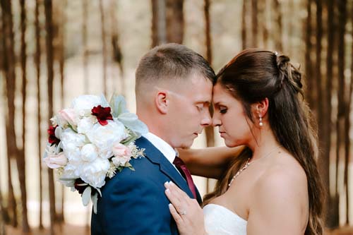 Couple sharing a special moment a a Dahlonega Wedding Venue